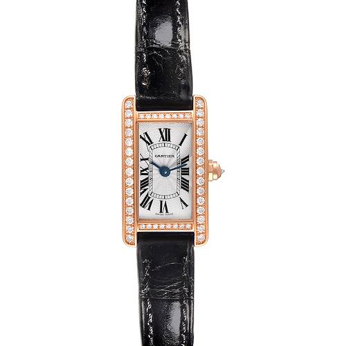 The Cartier Tank Americaine watch is shown from a top view, highlighting its rectangular face, black strap, and diamond bezel.