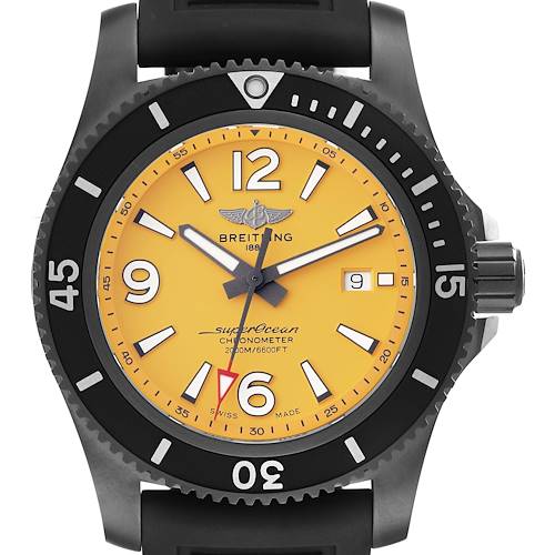 The Breitling Superocean watch is shown from a front angle, highlighting its yellow dial, bezel, and partial rubber strap.