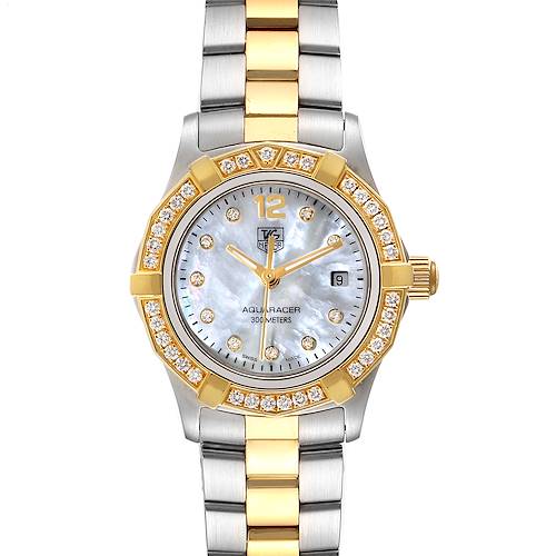 The Tag Heuer Aquaracer watch is shown from a top-down angle, displaying its face, bezel, and bracelet.