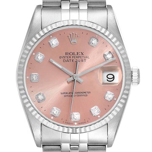 This image shows a front view of the Rolex Datejust watch, highlighting its pink dial, fluted bezel, and date display at 3 o'clock.