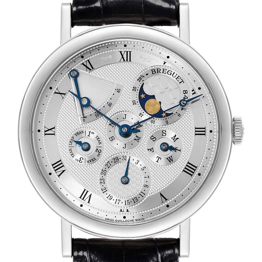 The image shows a front view of the Breguet Classique watch, featuring dials, Roman numerals, and a moon phase indicator.