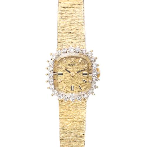 The image shows a frontal view of the Rolex Cocktail model watch, highlighting its dial, bezel, and part of the bracelet.