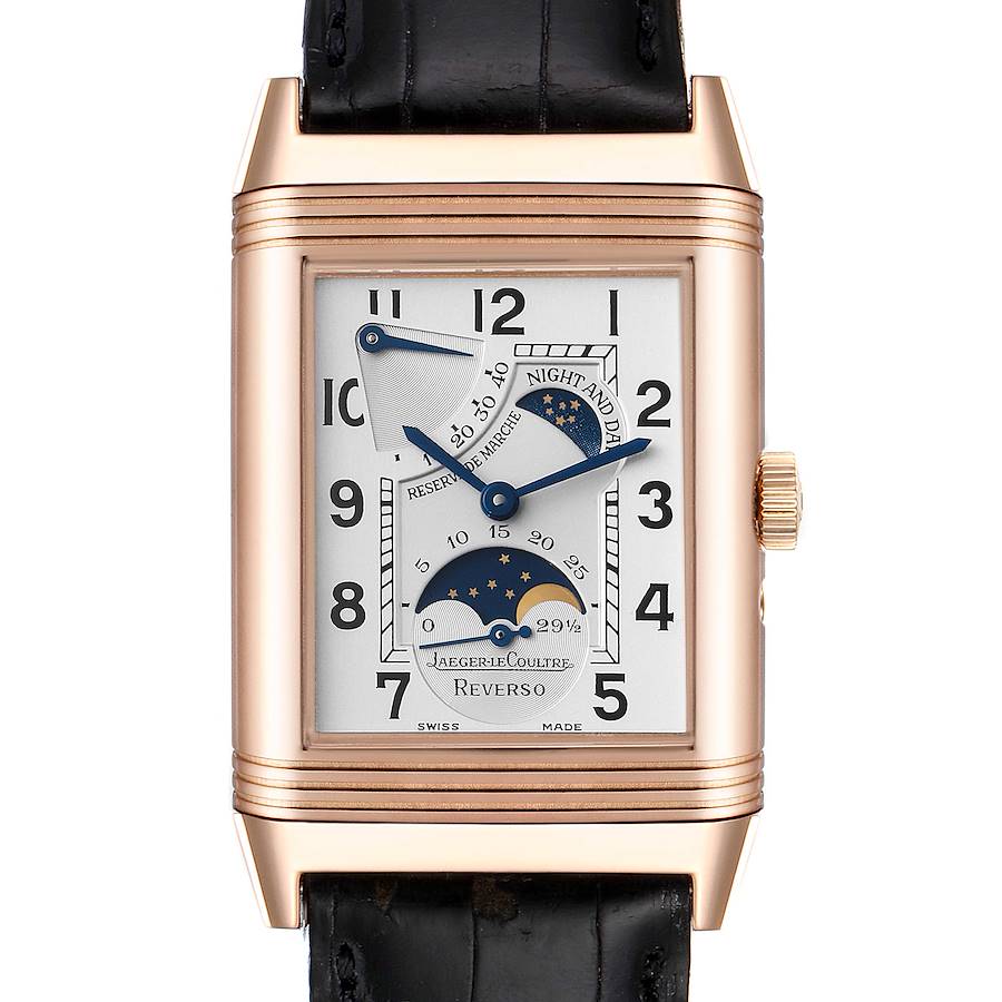 The Jaeger LeCoultre Reverso watch is shown from the front, highlighting the dial, hands, date, and power reserve indicators.