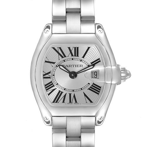 The Cartier Roadster watch is shown from the front, displaying the dial, Roman numerals, date window, and part of the bracelet.