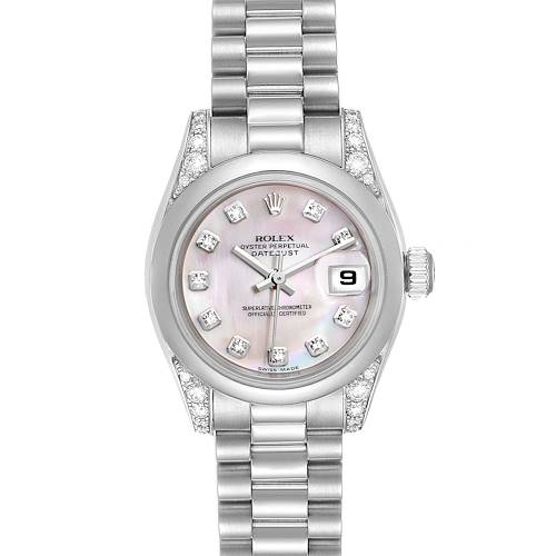 The image shows a Rolex President model watch straight on, highlighting the face, bracelet, and bezel with diamonds.