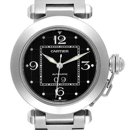 The Cartier Pasha watch is shown from a front angle, displaying the face, crown, and part of the bracelet.