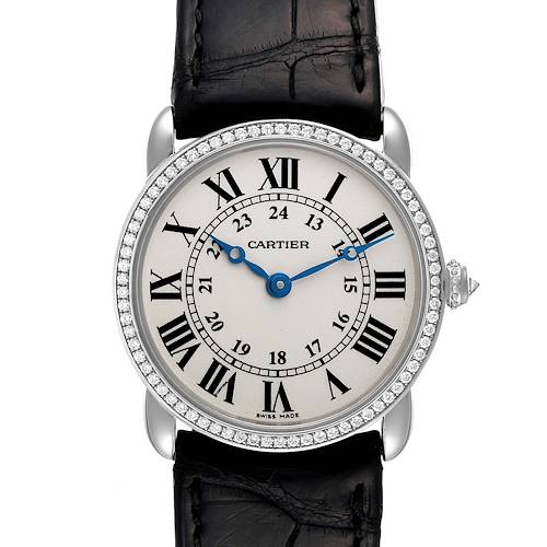 The image shows a front angle of the Cartier Ronde watch, featuring its circular face, Roman numerals, blue hands, and a leather strap.