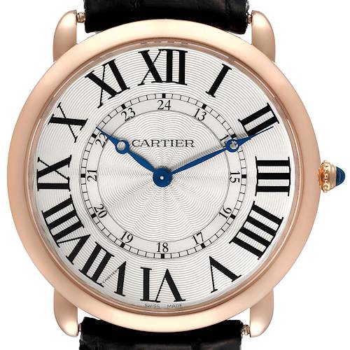 The image shows a front view of the Cartier Ronde watch, highlighting its dial with Roman numerals and blue hands.