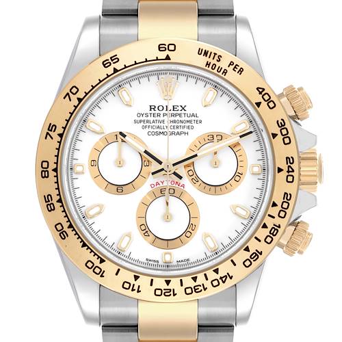 The Rolex Daytona watch is shown from the front, displaying the face, bezel, and pushers in a close-up view.