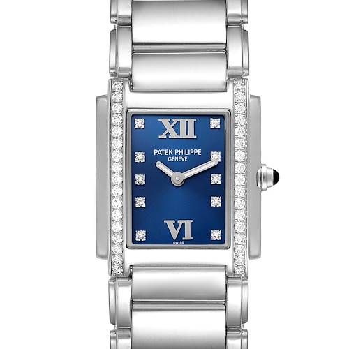 The image shows a front view of the Patek Philippe Twenty-4 model, highlighting its blue dial, diamond accents, and stainless steel bracelet.