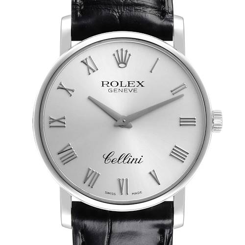 The Rolex Cellini watch is shown from the front, displaying the face, Roman numerals, and black leather strap.