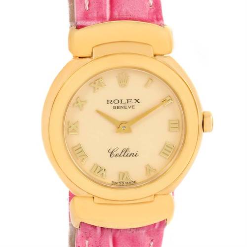 This is a close-up, front view of a Rolex Cellini watch, showing its face, dial, and part of the pink strap.