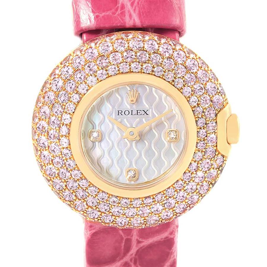 This image shows a front view of a Rolex Cellini watch, highlighting its diamond-studded bezel and pink strap.