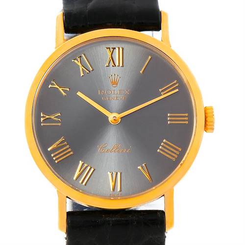 The image shows a front view of the Rolex Cellini watch, highlighting its face, Roman numerals, and black leather strap.