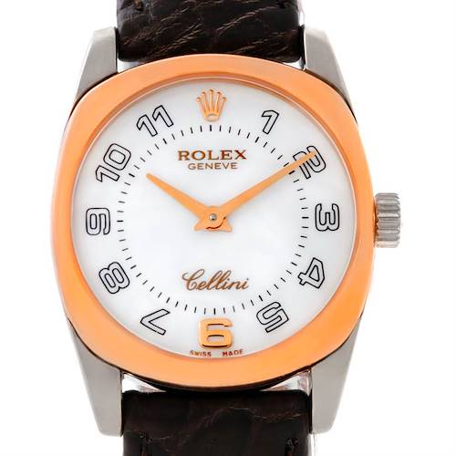 This image shows a close-up of the Rolex Cellini watch face and crown, highlighting its dial, hands, and part of the strap.