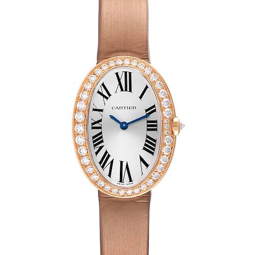 This image shows a Cartier Baignoire watch from a front angle, highlighting its oval face, Roman numerals, and diamond bezel.