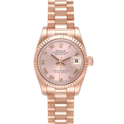 The image shows a frontal view of a Rolex President model watch, highlighting its dial, bracelet, and date window.