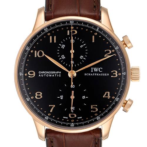 The image shows a front view of the IWC Portuguese Chronograph watch with a polished gold case, black dial, and brown leather strap.