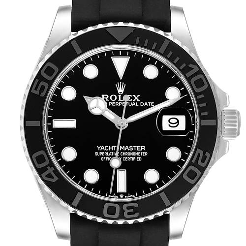 The Rolex Yacht-Master watch is shown from a front angle, displaying the face, bezel, and part of the strap.
