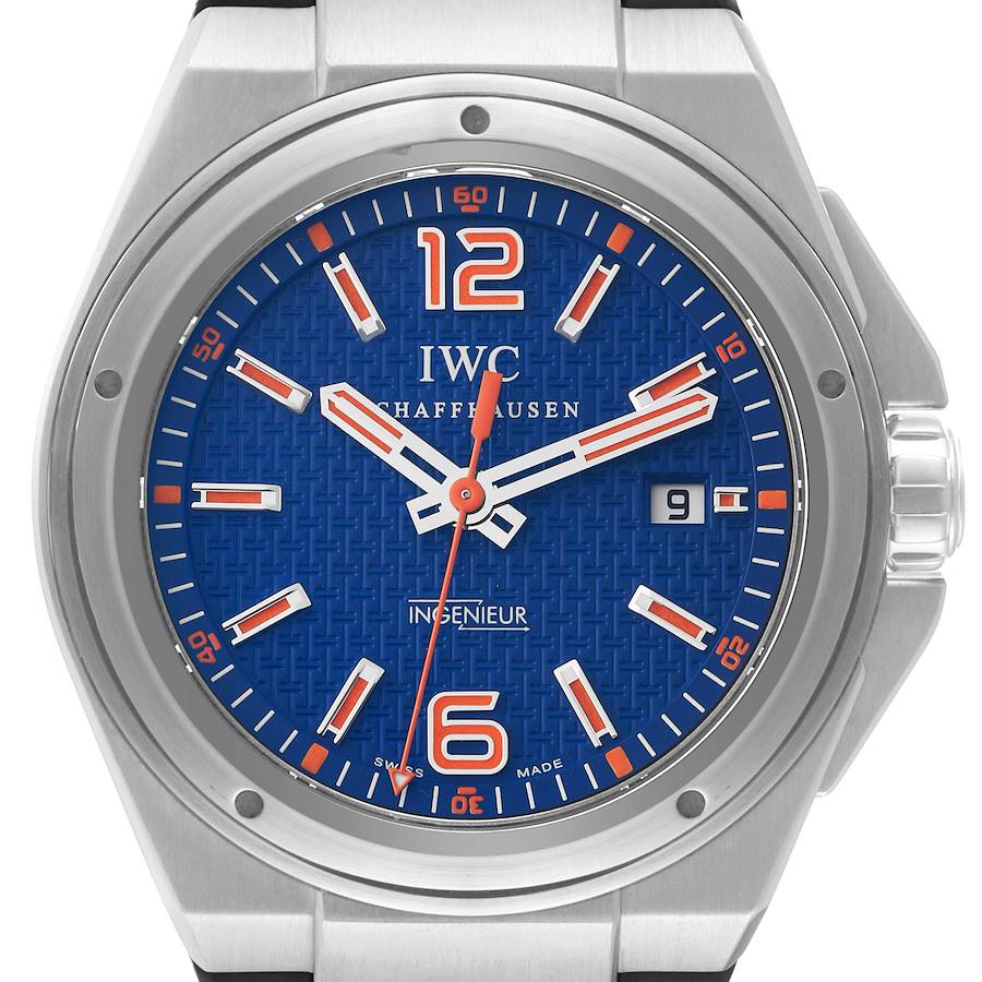 The IWC Ingenieur watch is shown from a front angle, highlighting the blue dial, hands, hour markers, and date window.