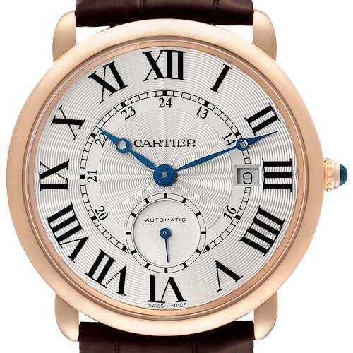 The image shows a front view of the Cartier Ronde watch, highlighting its round gold case, Roman numeral dial, and blue hands.