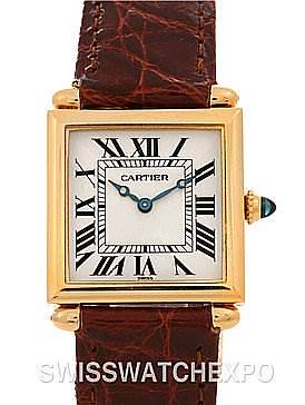 This image shows a frontal view of the Cartier Tank Obus watch, highlighting its dial, gold case, and leather strap.
