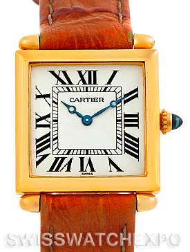 The image shows a frontal view of the Cartier Tank Obus watch, featuring its dial, hands, Roman numerals, crown, and strap.