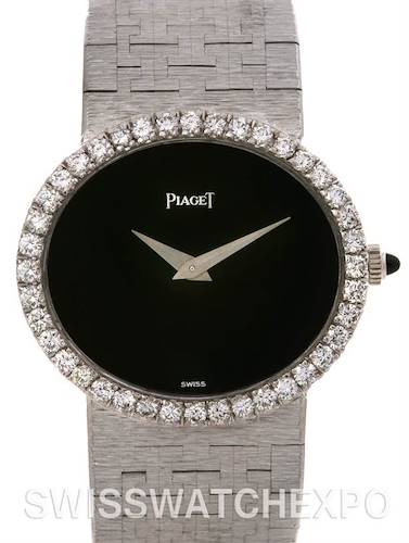 The Piaget 18k White Gold Diamond Onyx Dial Vintage Ladies Watch is shown from a direct front angle, displaying its face, bezel, and bracelet.