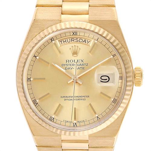 This image shows a Rolex Oysterquartz Day-Date watch from a front angle, highlighting the dial, hands, bezel, crown, and bracelet.