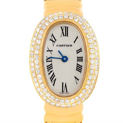 This image shows a frontal view of a Cartier Baignoire watch, highlighting the oval face, diamond bezel, and Roman numeral dial.