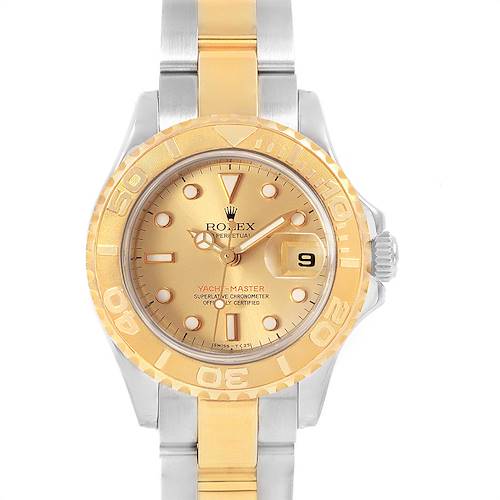 The image shows a front view of a Rolex Yacht-Master watch, featuring a two-tone metallic design and a date window at 3 o'clock.