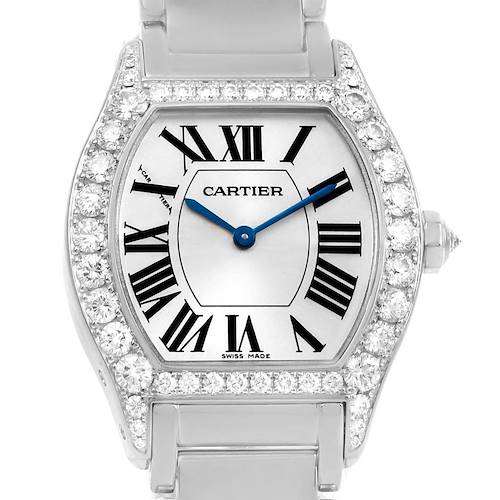 This image shows a close-up of the Cartier Tortue watch face, including its diamond-studded bezel and roman numeral markers.