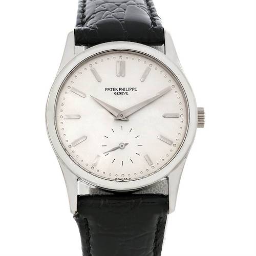 The image shows a front view of a Vintage Patek Philippe watch, highlighting the dial, hands, markers, and black leather strap.