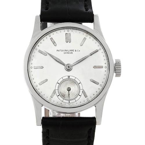 This Vintage Patek Philippe watch is shown from the front, displaying its face, dial, and black leather strap.