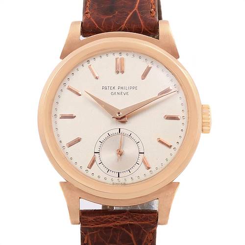 This Patek Philippe Vintage model watch is shown from the front, displaying its face, hands, and brown leather strap.