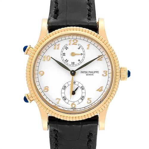 The image shows a Patek Philippe Calatrava watch from a front view angle, displaying its dial, hands, subdials, and leather strap.