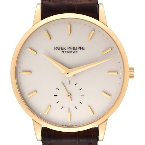 This image shows a front view of a Patek Philippe Calatrava watch, displaying the dial, hands, and minimalistic markers.