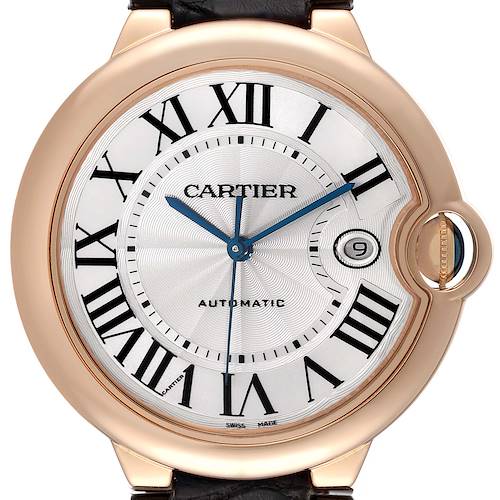This image shows a close-up of the face of a Cartier Ballon Bleu watch, highlighting its dial, hands, and crown.