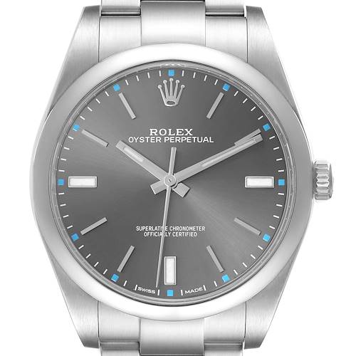 The image shows a frontal view of a Rolex Oyster Perpetual watch, highlighting its dial, hands, and bracelet top links.