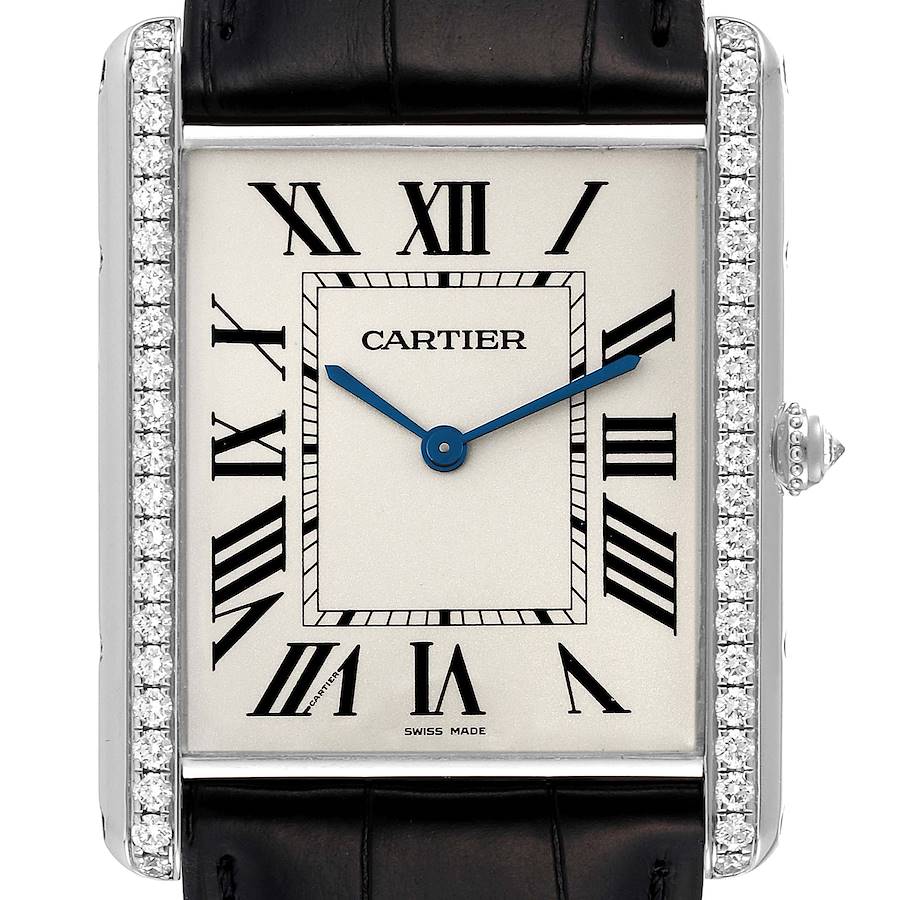 This image shows a frontal view of a Cartier Tank Louis watch, highlighting its rectangular face, Roman numerals, and diamond-studded frame.