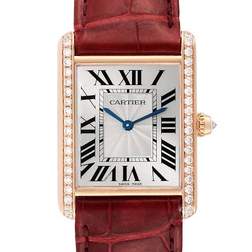 The image shows a frontal view of a Cartier Tank Louis watch, highlighting its rectangular dial, Roman numerals, and a leather strap.