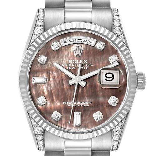 This image shows the front view of a Rolex President model watch, highlighting the dial, hands, date, and bezel.