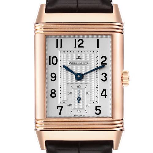 The image shows a straight-on view of the Jaeger LeCoultre Reverso watch, displaying its rectangular face, hands, and crown.