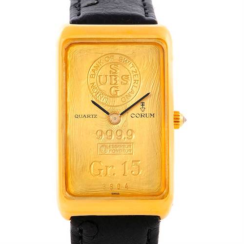 The image shows a front view of a vintage Corum quartz watch with a gold-bar styled rectangular face and black leather strap.