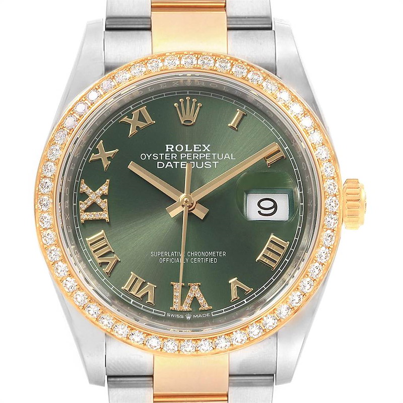 This image shows a front view of a Rolex Datejust watch with a gold and silver band, diamond-encrusted bezel, and green Roman numeral dial.