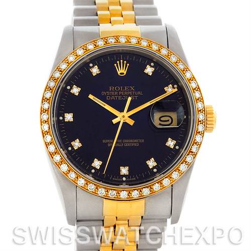 This image shows a Rolex Datejust watch from the front, highlighting the black dial, diamond hour markers, and two-tone bracelet.