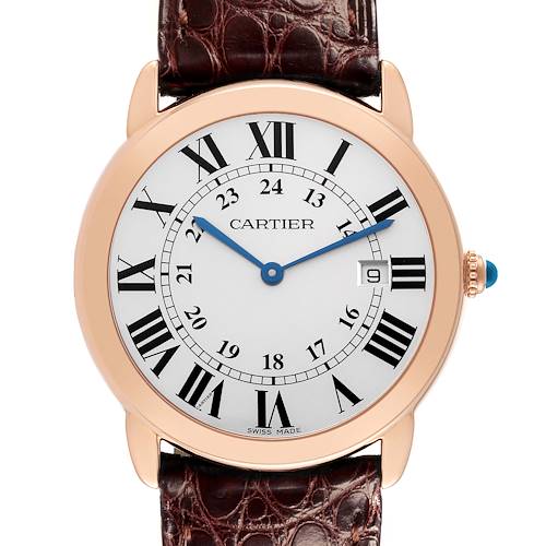 The Cartier Ronde watch is shown from the front, displaying its round dial, Roman numerals, and leather strap.