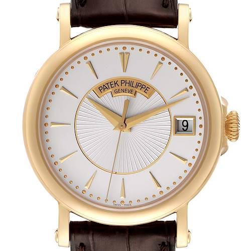 The image shows a frontal view of the Patek Philippe Calatrava watch, highlighting its face, hands, crown, and date window.