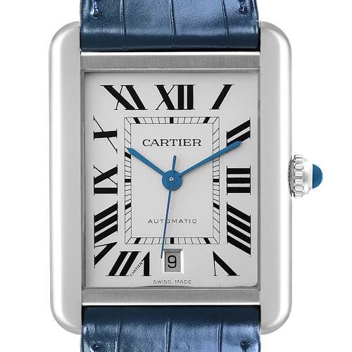 The Cartier Tank Solo watch is shown from a front angle, displaying its rectangular face, Roman numerals, blue hands, and a blue leather strap.