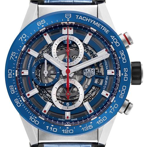 The Tag Heuer Carrera watch is shown front-facing, highlighting the dial, tachymeter bezel, and chronograph subdials.